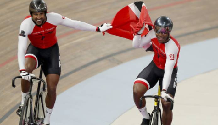 Photo: Trinidad and Tobago cyclists Njisane Phillip (left) and Nicholas Paul celebrate after helping Team TTO cop gold in the Men’s Team Sprint final at the Pan American Games in Lima, Peru on 1 August 2019. (Copyright AP Photo/Fernando Llano/Wired868)