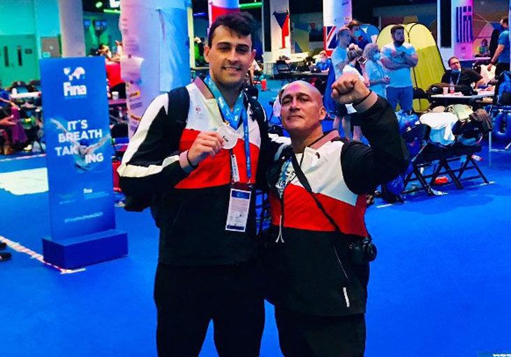 BUDDING PARTNERSHIP: Trinidad and Tobago swim coach Dexter Browne, right, and Dylan Carter at the World Short Course Championships in Abu Dhabi, on Monday.