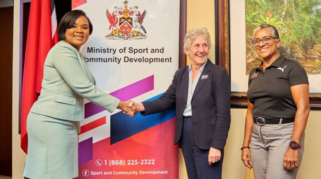 Minister of Sport and Community Development Shamfa Cudjoe, left, greets Commonwealth Youth Games president Dame Louise Martin as TTOC president Diane Henderson looks on during a meeting on Monday at the ministry, Port of Spain. Photo courtesy Ministry of Sport and Community Development (Image obtained at newsday.co.tt)