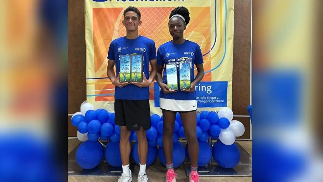 FLASHBACK: Makeda Bain and Christopher Khan with their Under-16 and Under-18 prizes following the recent RBC Junior Tennis Tournament at the National Racquet Centre, Tacarigua. (Image obtained at trinidadexpress.com)