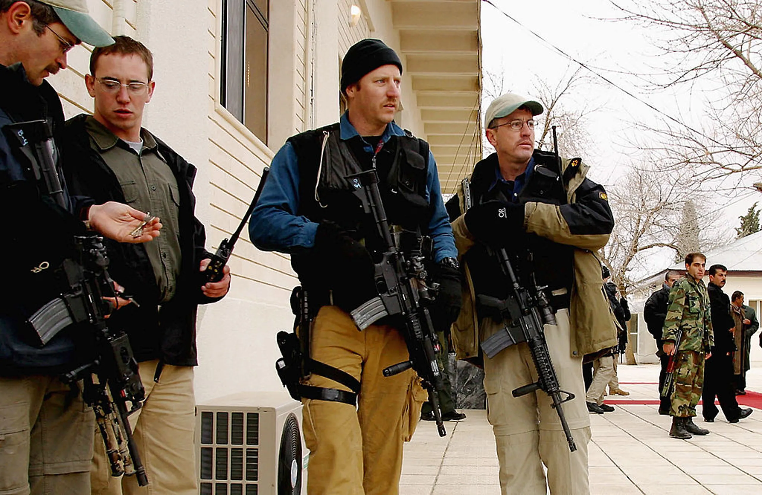 US Diplomatic Security Service policemen with members of the Kurdistan militia. GETTY IMAGES (Image obtained at insidethegames.biz)