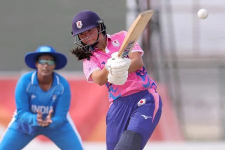 Japan's Ayaka Kato Stafford (centre) hits a shot during the women's cricket match against India at the 2026 Asian Games in Nagoya on September 18, 2026. (Image obtained at arabnews.jp)