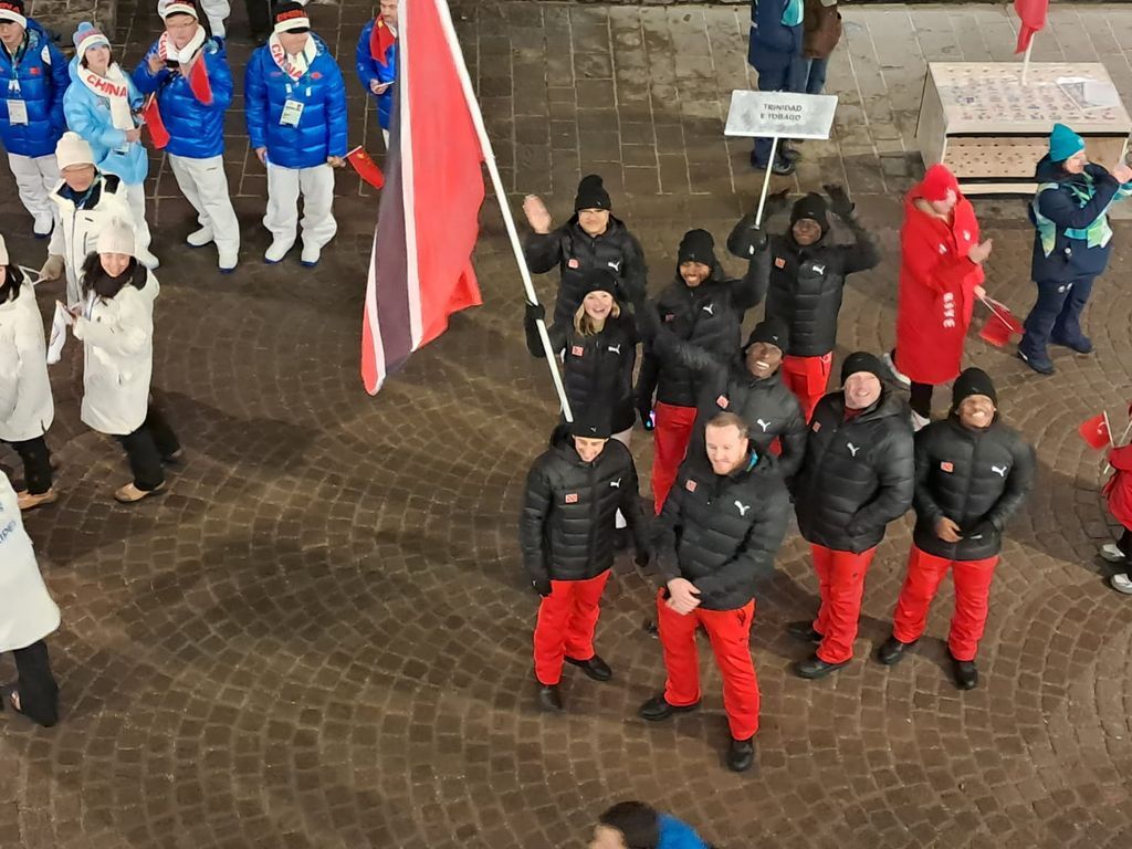 T&T Winter Olympic team on parade at yesterday's opening ceremony. (Image obtained at guardian.co.tt)